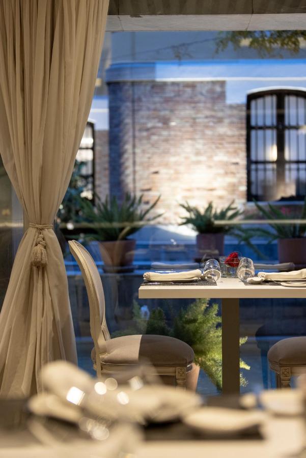 Hospes Palacio De Los Patos, A Member Of Design Hotels Grenade Extérieur photo Restaurant