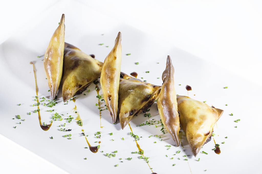 Hospes Palacio De Los Patos, A Member Of Design Hotels Grenade Extérieur photo Baked samosa